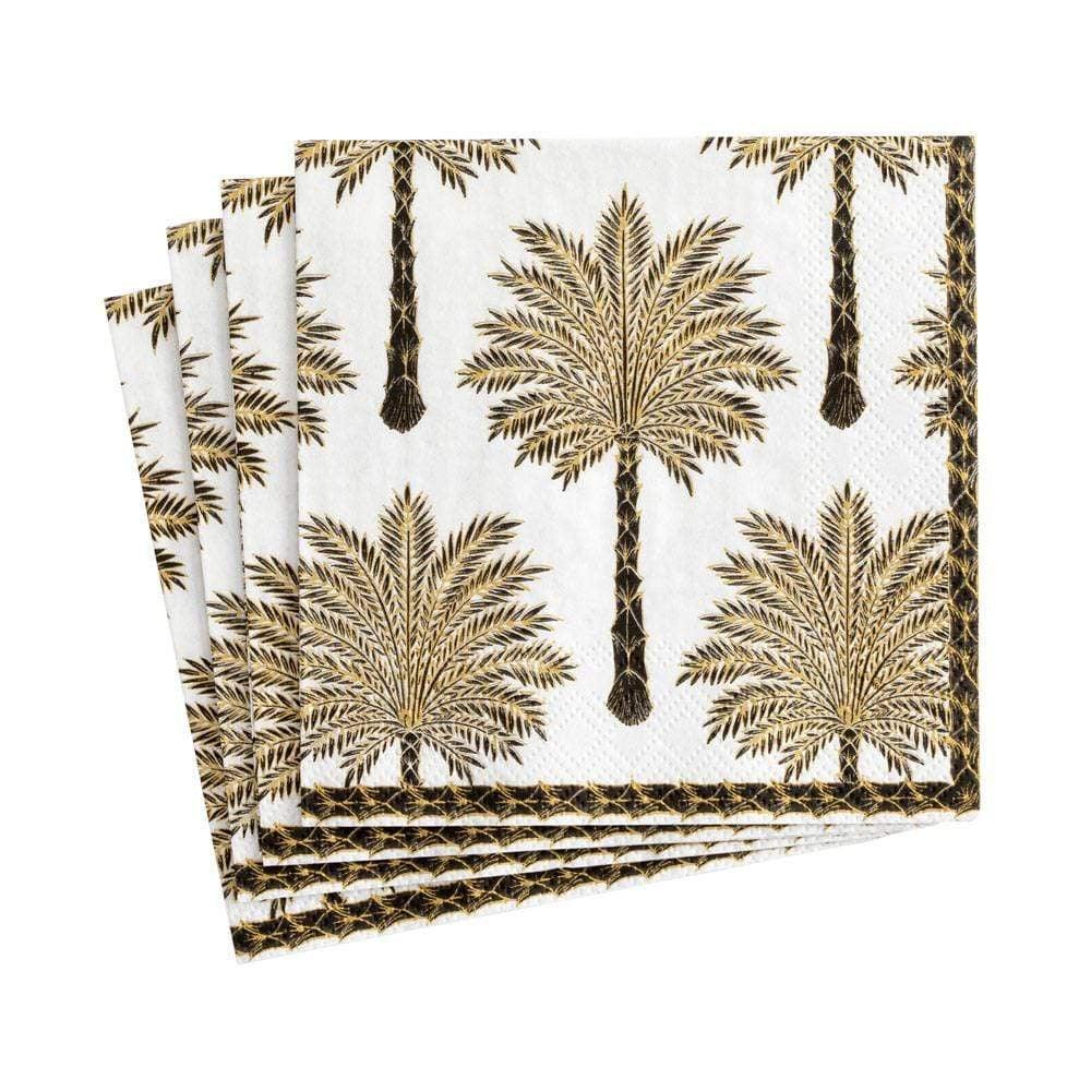 A stack of paper dinner napkins with palm tree motif.
