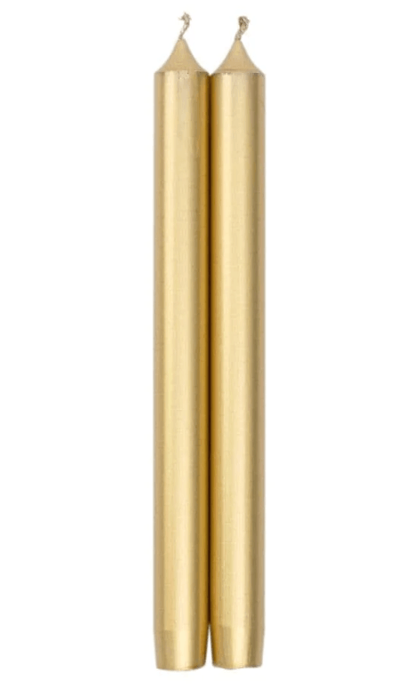 A close-up of a pair of gold candles suitable for any type of event.
