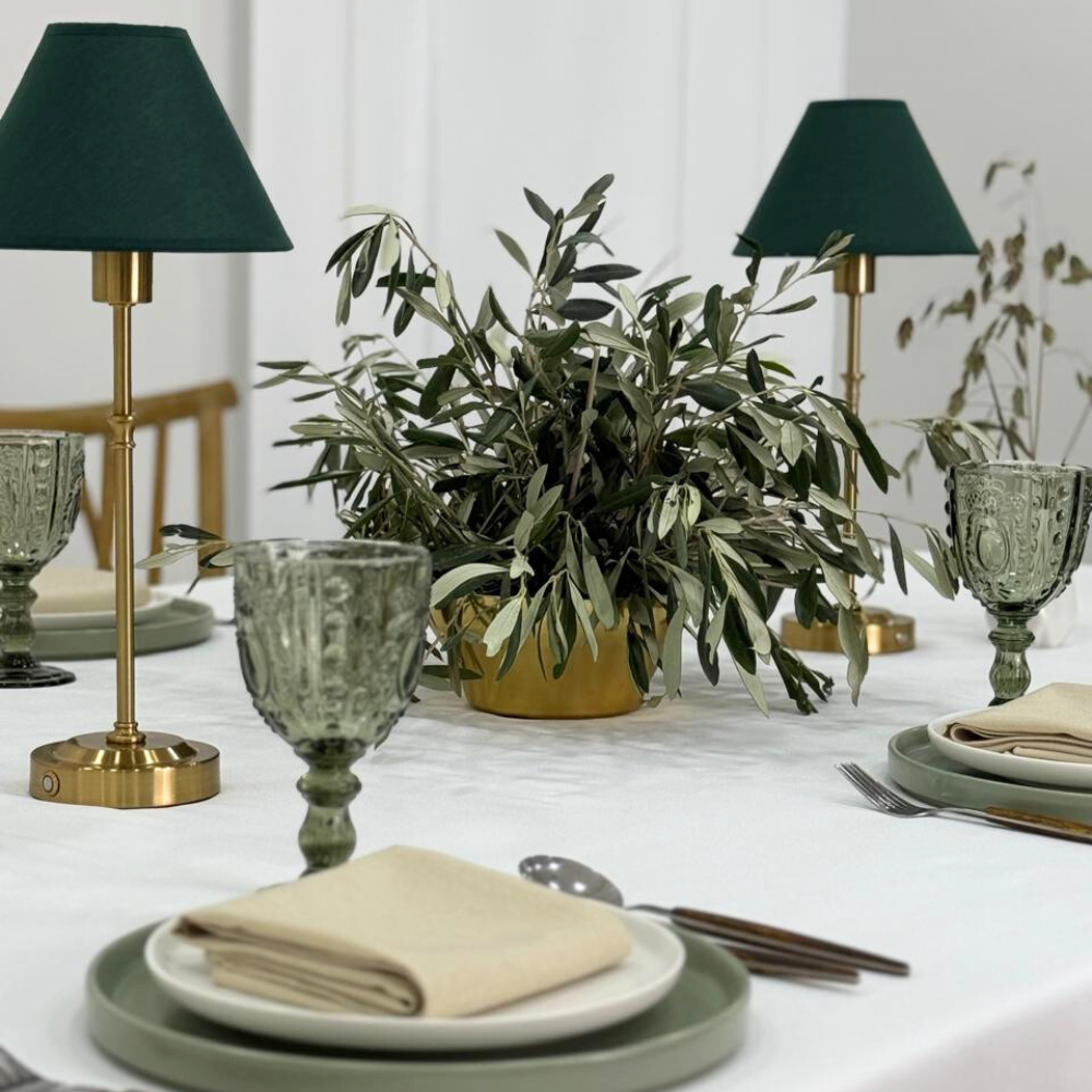 Green with Gold Base Wireless Lamp elegantly showcased on a table, surrounded by plates, glasses, and a gold candle holder, suitable for events.