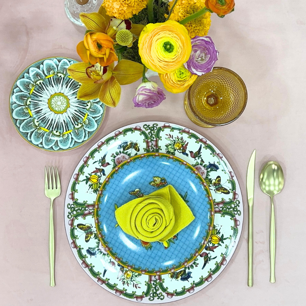 Blush Velvet Dreams-Dining Setup featuring elegant tableware, floral centerpieces, and champagne cutlery, designed for a sophisticated dinner party setting.