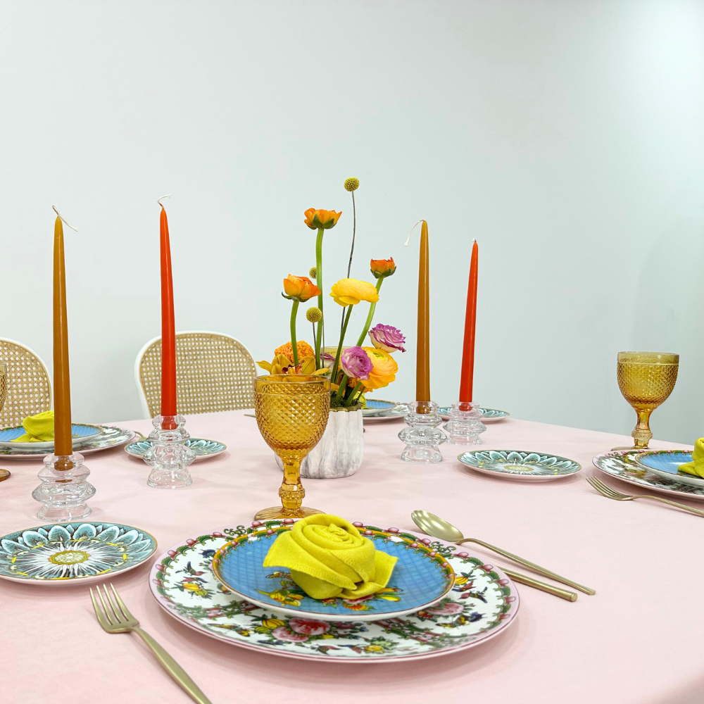 Blush Velvet Dreams-Dining Setup featuring elegant tableware, folded rose napkins, candle holders, and flower centerpieces, perfect for an exquisite dining experience for eight.