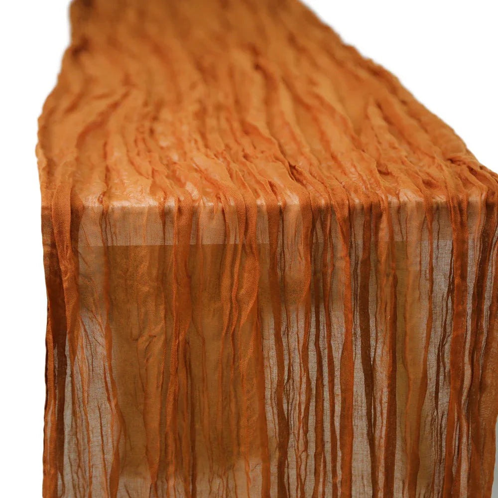 Gauze table runner with a textured finish, ideal for elegant table settings at special occasions, enhancing any event&