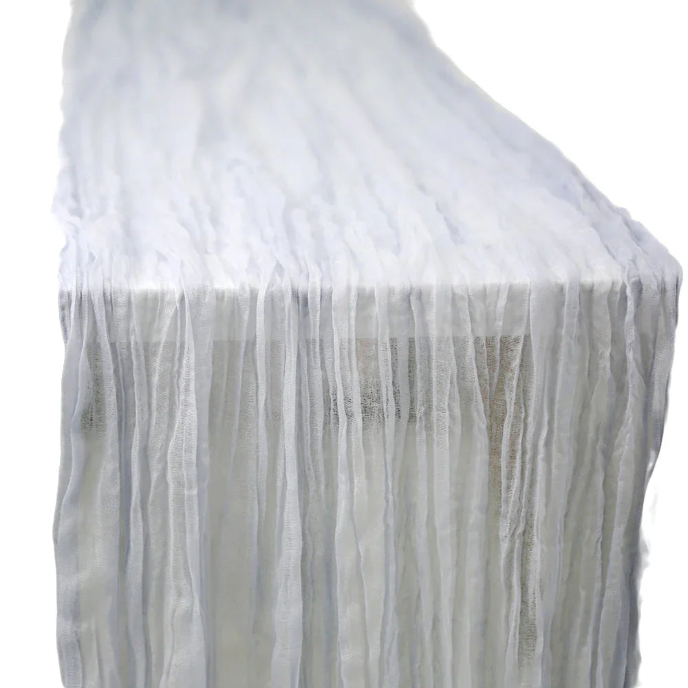 GAUZE TABLE RUNNERS with ruffled edges, ideal for adding a glamorous touch to special occasion tabletops. Perfect for elegant dining setups.