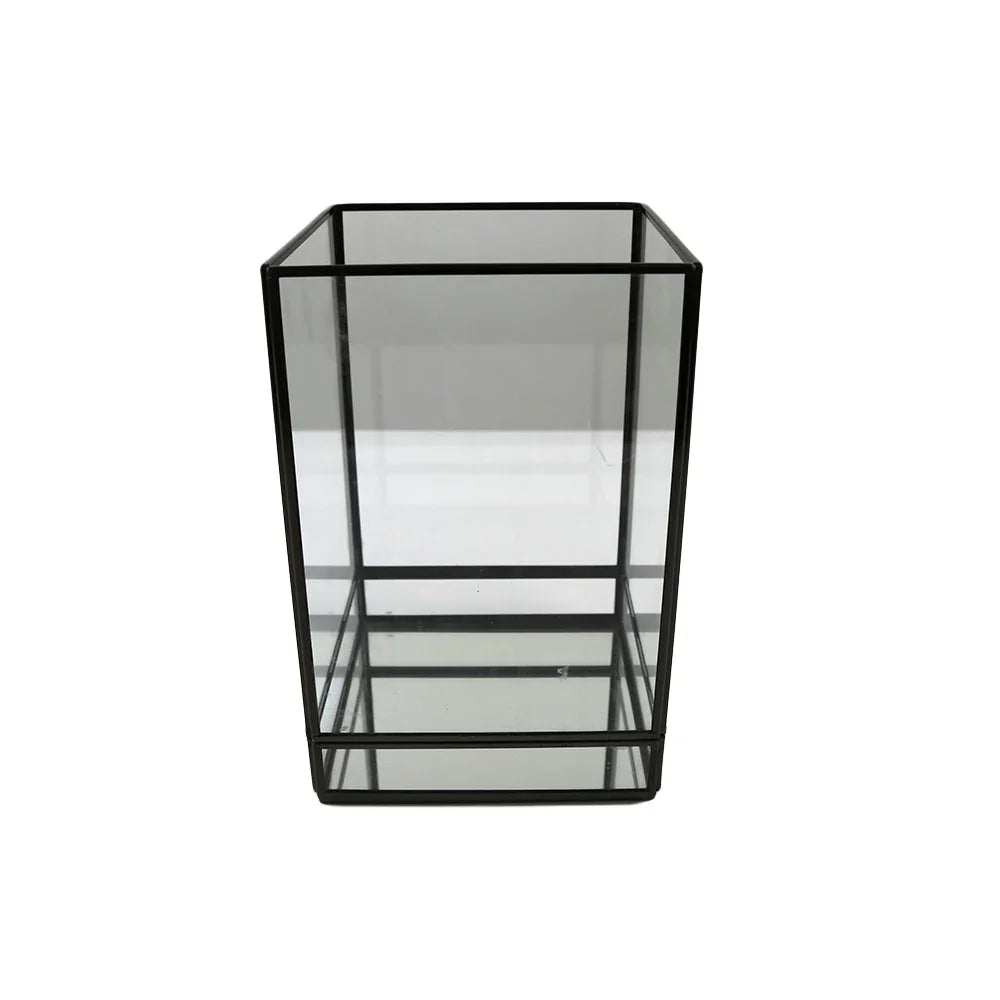 Modern Black Edge Lanterns featuring a sleek glass design with a black frame, ideal for enhancing table settings with flowers or candles at events.