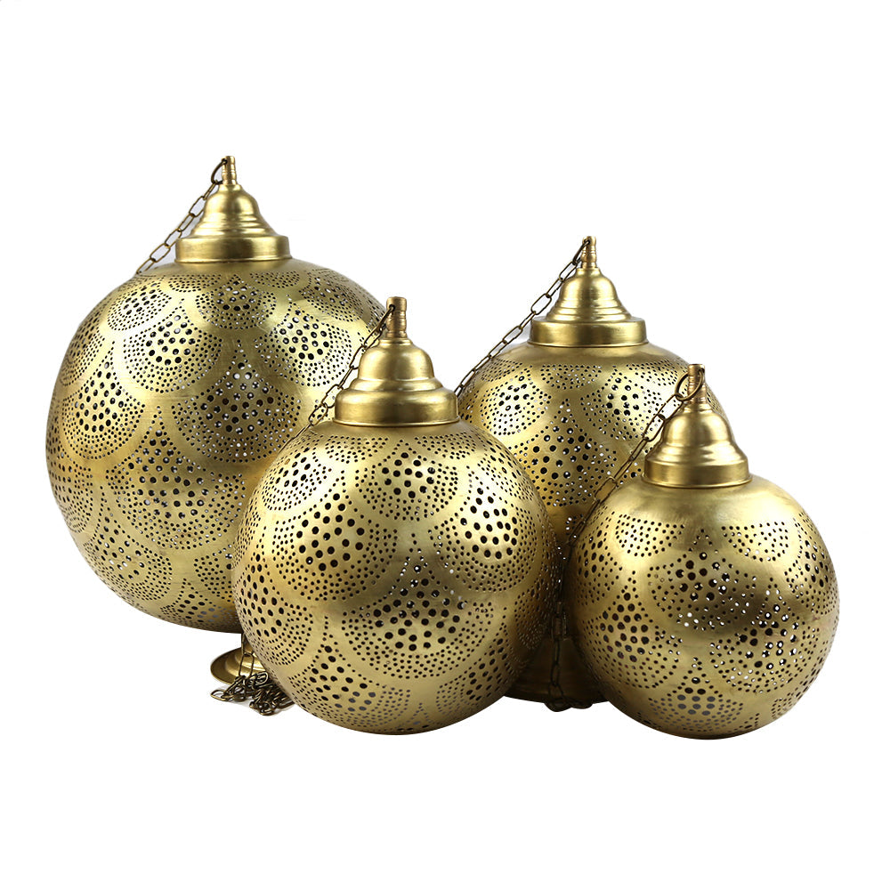 Brass Hanging Pendant lanterns showcasing intricate gold detailing, perfect for adding a warm glow to event settings with a candle inside.