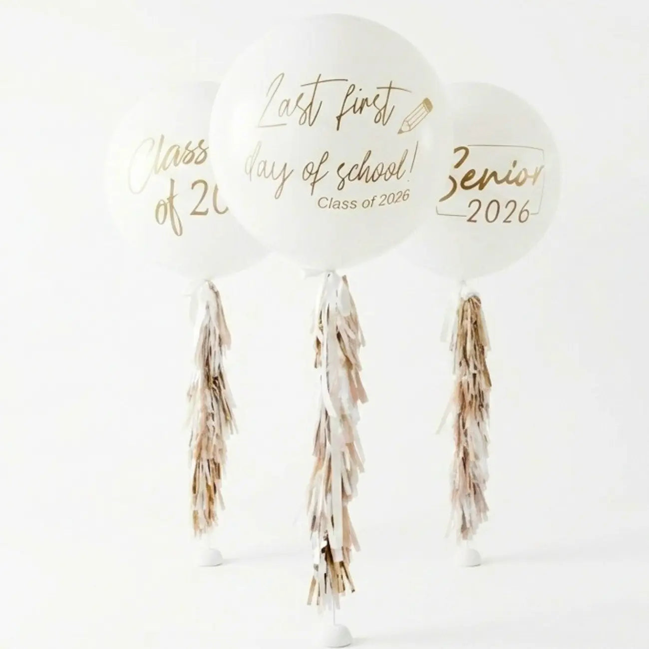 Prestige Balloon Bouquet with metallic gold script for Class of 2026, featuring decorative tassel tails, perfect for celebrating milestone school events.
