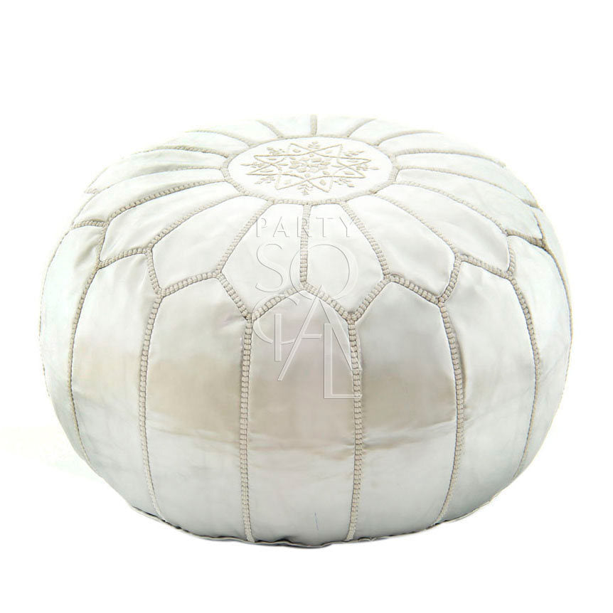 MOROCCAN LEATHER POUFS: A white leather pouf, versatile as seating or decoration, with a snowflake design, ideal for enhancing event decor.