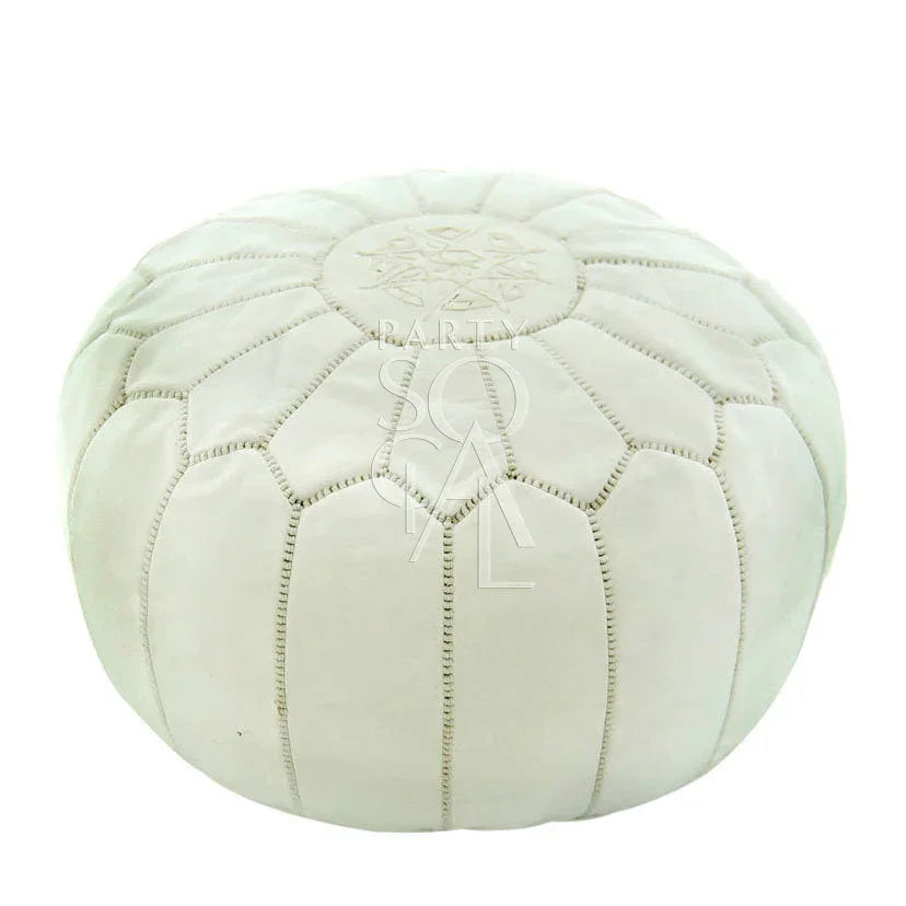 MOROCCAN LEATHER POUFS: White leather pouf, versatile for seating or as a small table, adding elegance and functionality to event settings.
