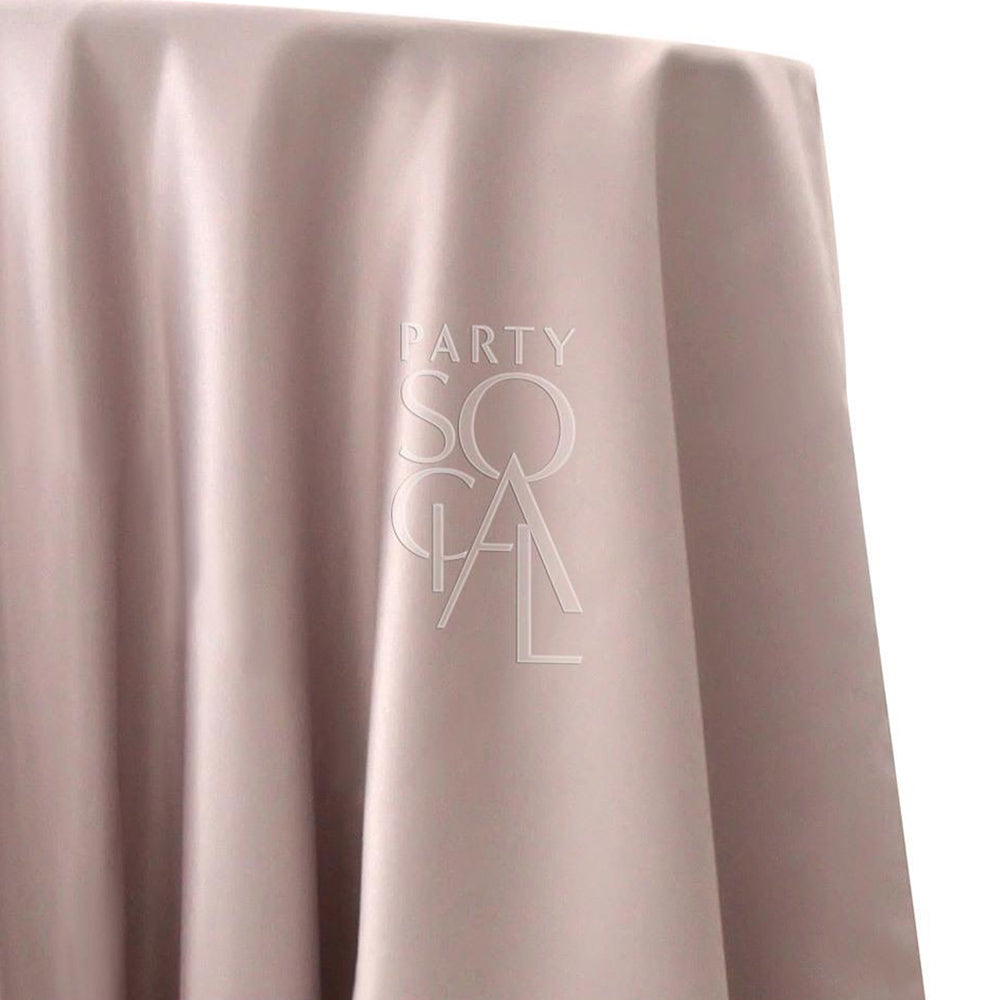 ROUND TABLECLOTH SATIN, featuring a close-up of its premium satin fabric, ideal for enhancing special occasions with elegance.