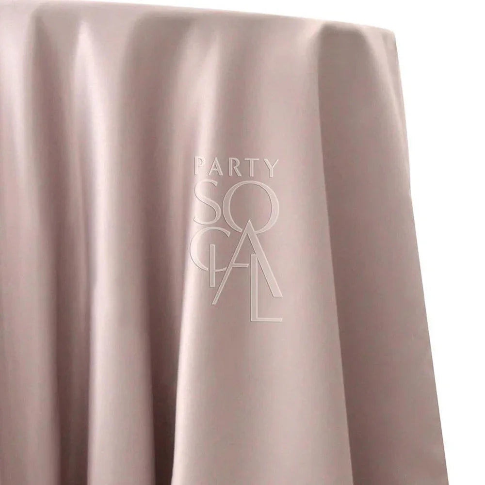 ROUND TABLECLOTH SATIN, featuring a close-up of its premium satin fabric, ideal for enhancing special occasions with elegance.