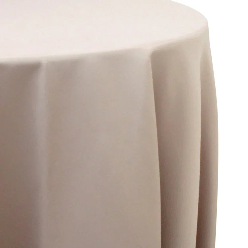 Round satin tablecloth displayed on a table, highlighting its premium quality and elegance, ideal for enhancing special occasions and event settings.