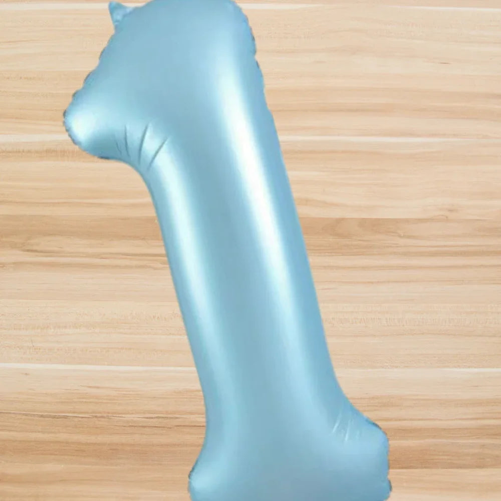Matte Blue Foil Number Balloon (40 inch) on a wooden surface, perfect for enhancing any celebratory event.