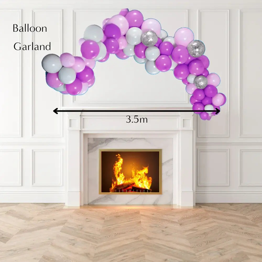 Balloon garland arch over a fireplace with dimensions indicated