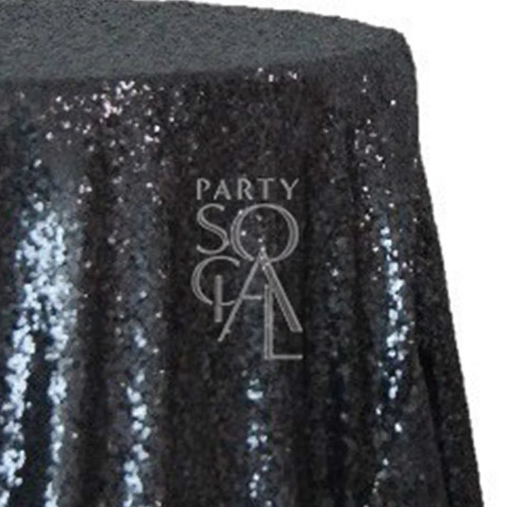 ROUND TABLECLOTH SEQUIN: A black sequin-adorned tablecloth, ideal for special occasions, highlighting Party Social&