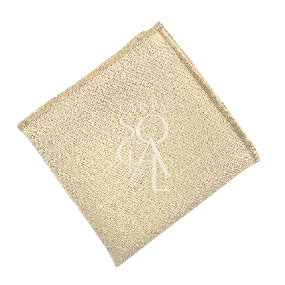 NAPKIN BLEACHED SAND W/ LINE featuring a stitched logo on beige linen blend, ideal for events. Enhance any table setting with this elegant napkin.