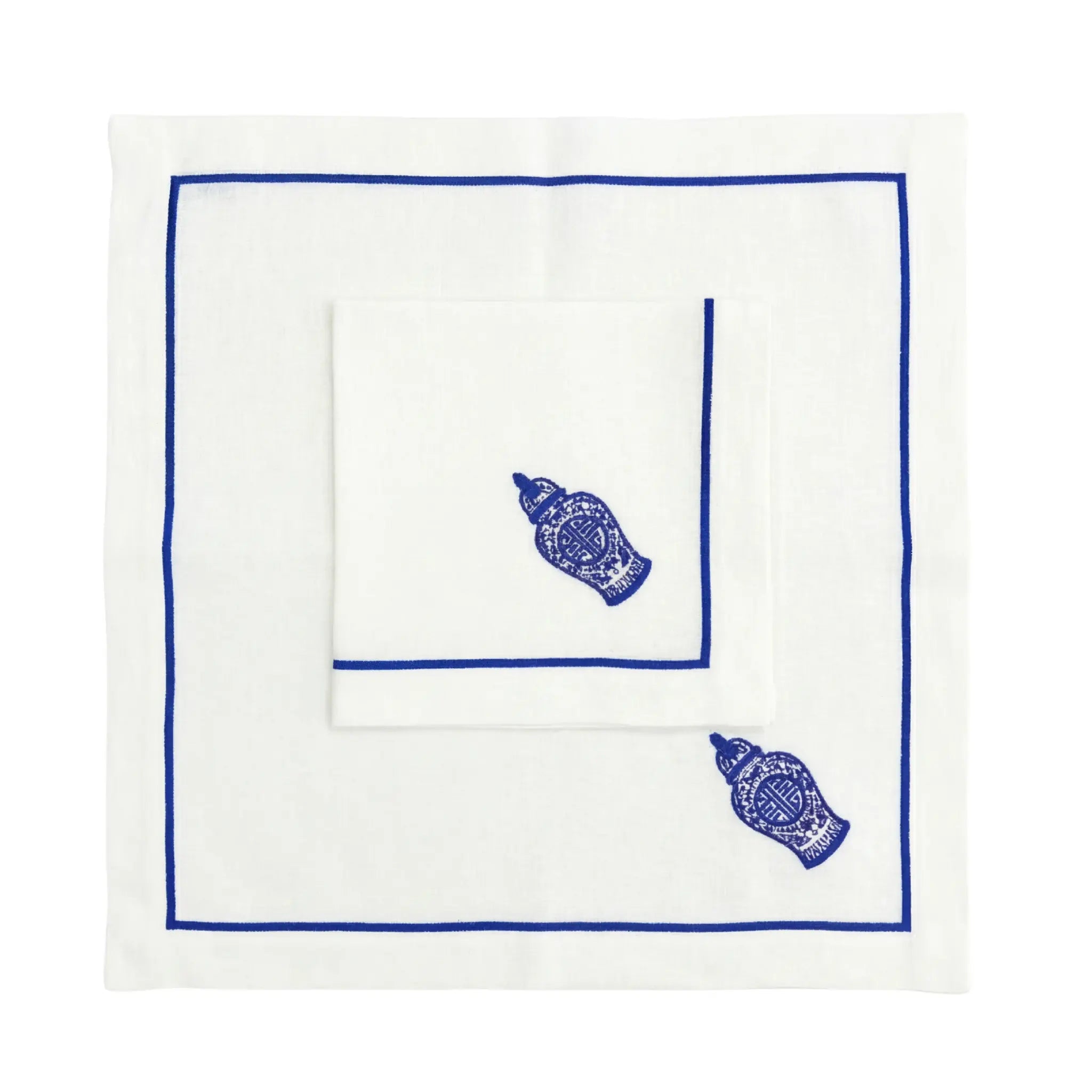 Blue Chinoiserie Pure Linen Dinner Napkin: Two square white napkins with cobalt-blue borders and ginger-jar motifs, enhancing elegant table settings.