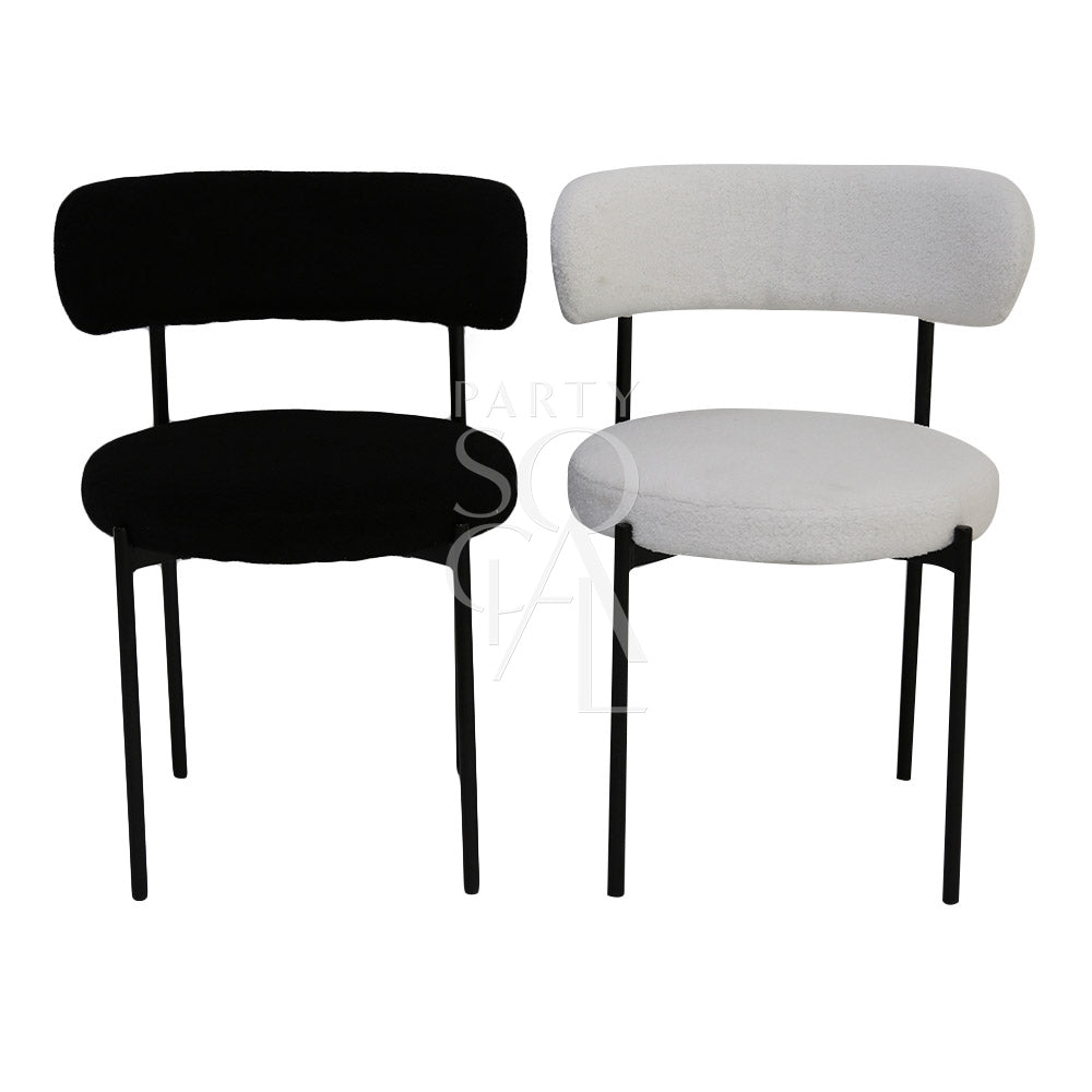 BOUCLE CHAIRS: Modern chair with sleek black legs, ideal for weddings and corporate events. Perfect for versatile party and event settings.