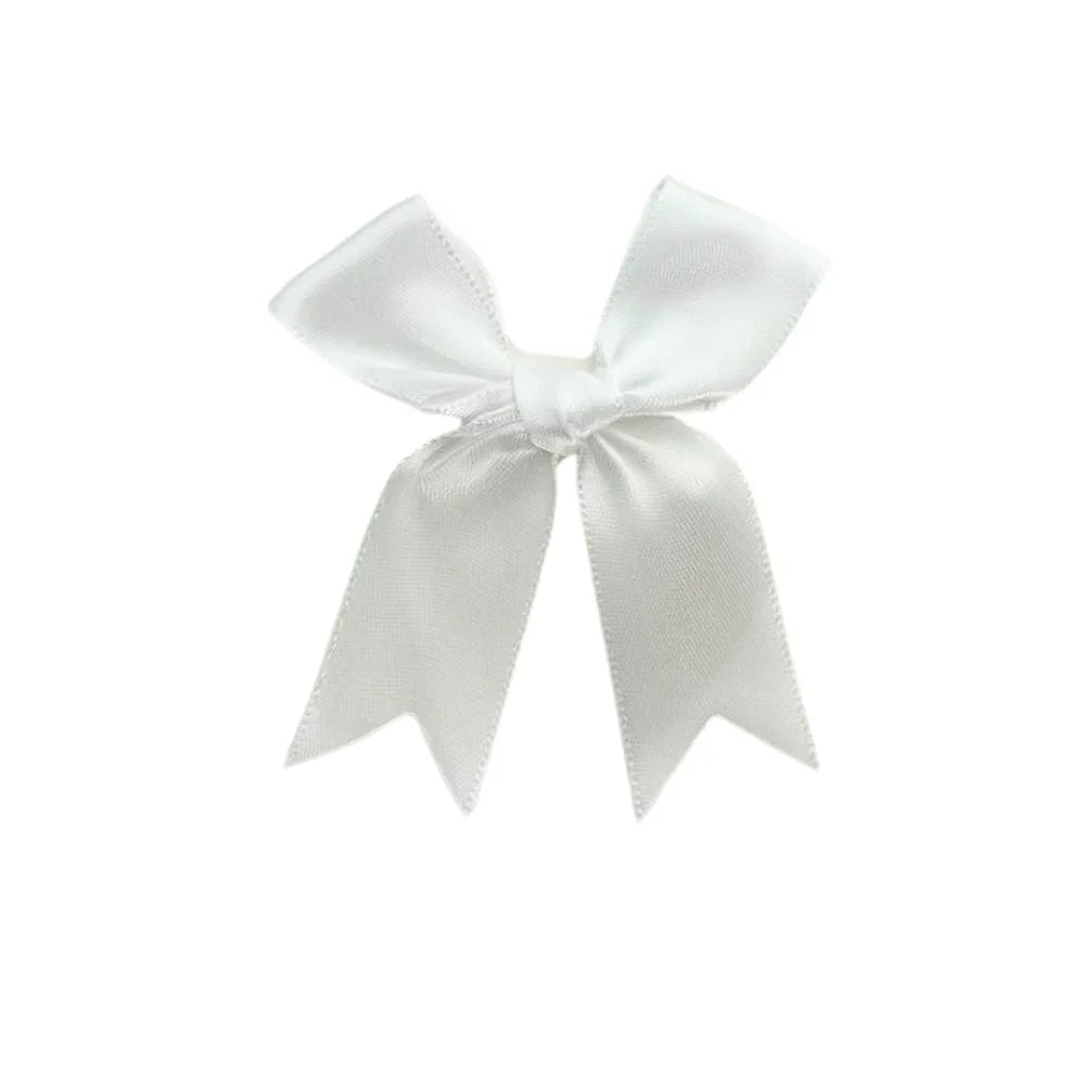 White Bow with a neat knot and stitched edges, ideal for decorating party settings or gift wrapping from Party Social&