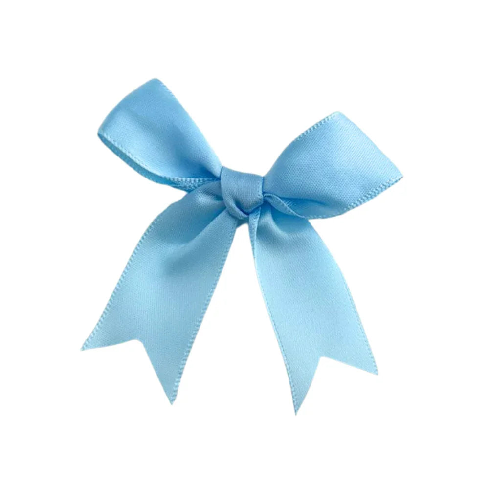 Sky Blue Bow with elegant design, perfect for adorning gifts or enhancing party decor, available at Party Social for your event needs.