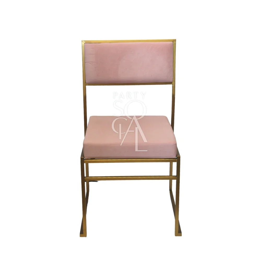 CHARLOTTE CANTILEVER VELVET CHAIR, a pink chair with a gold frame, ideal for weddings and corporate events, emphasizing elegance and versatility.