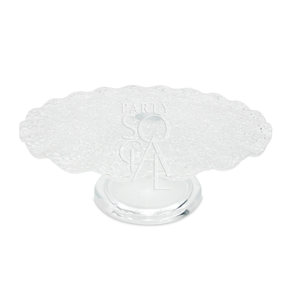 Clear cracked glass cake stand with scalloped edge, perfect for elegant displays or centerpieces. Available in two sizes from Party Social.