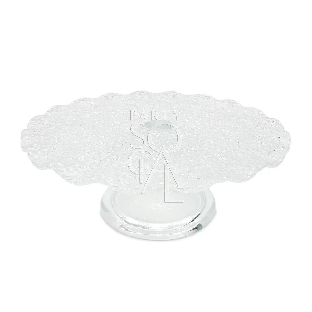 Clear cracked glass cake stand with scalloped edge, perfect for elegant displays or centerpieces. Available in two sizes from Party Social.