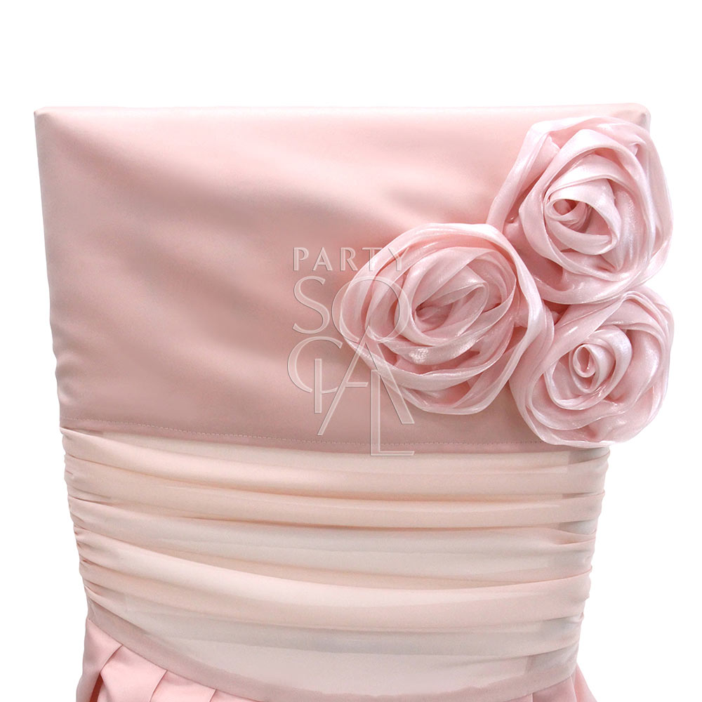 CHAIR COVER PINK SATIN CHIAVARI: Light pink satin chair cover with flower accents, designed for Chiavari chair rentals, perfect for elegant event settings.