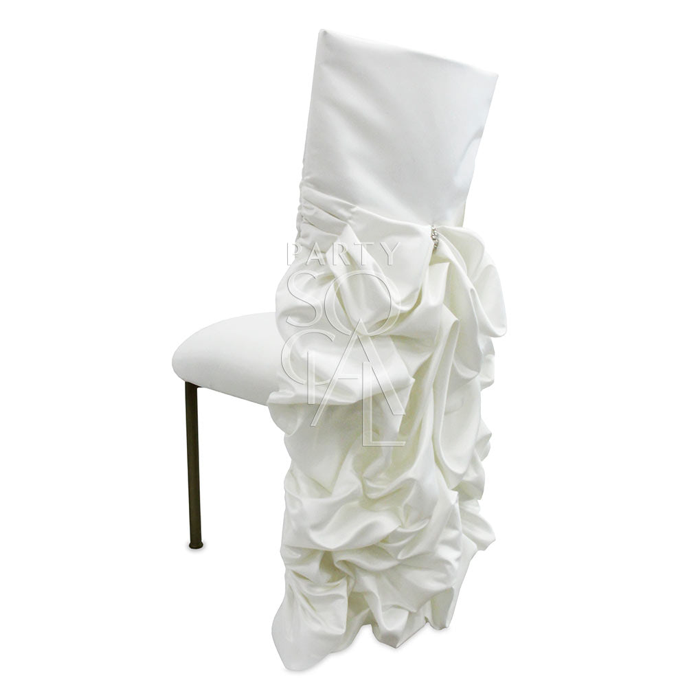 Chameleon chair cover in off-white satin with draped ruffles, custom designed for exclusive rental use with Chameleon chairs.