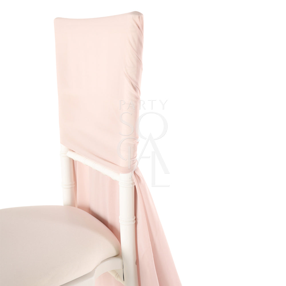 CHAIR COVER BLUSH PINK RUFFLED CHIAVARI draped over a white Chiavari chair, showcasing its elegant ruffled chiffon design for event rentals.