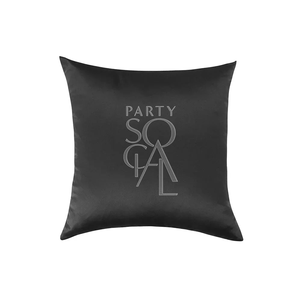 CUSHION COVER SATIN: Black cushion with a logo, crafted from premium satin fabric, available in various sizes, ideal for enhancing party decor or event settings.