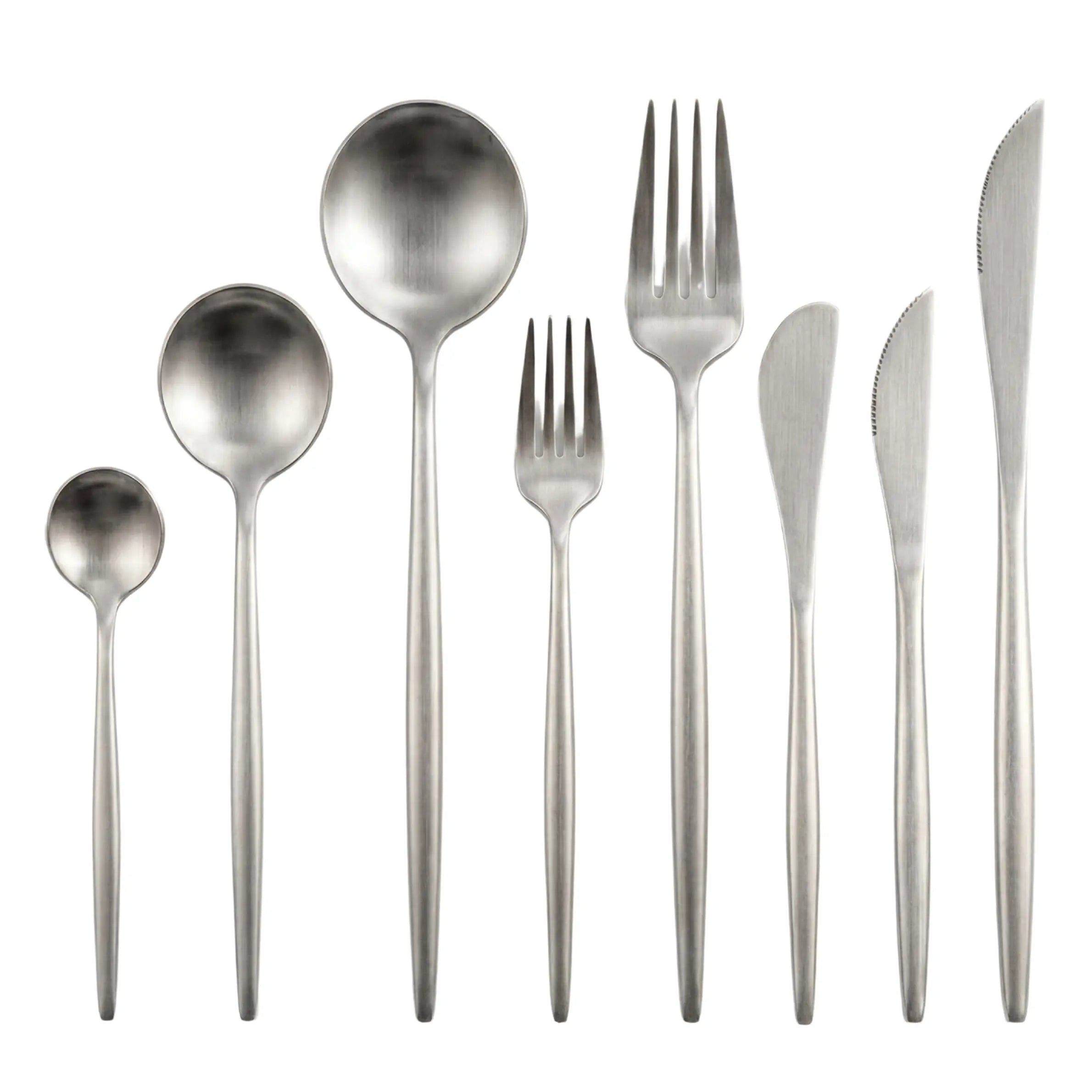 Silver Modern Cutlery Collection: Stainless-steel teaspoon, tablespoon, serving spoon, salad fork, dinner fork, two spreader knives, and a serrated dinner knife, ideal for elegant events.