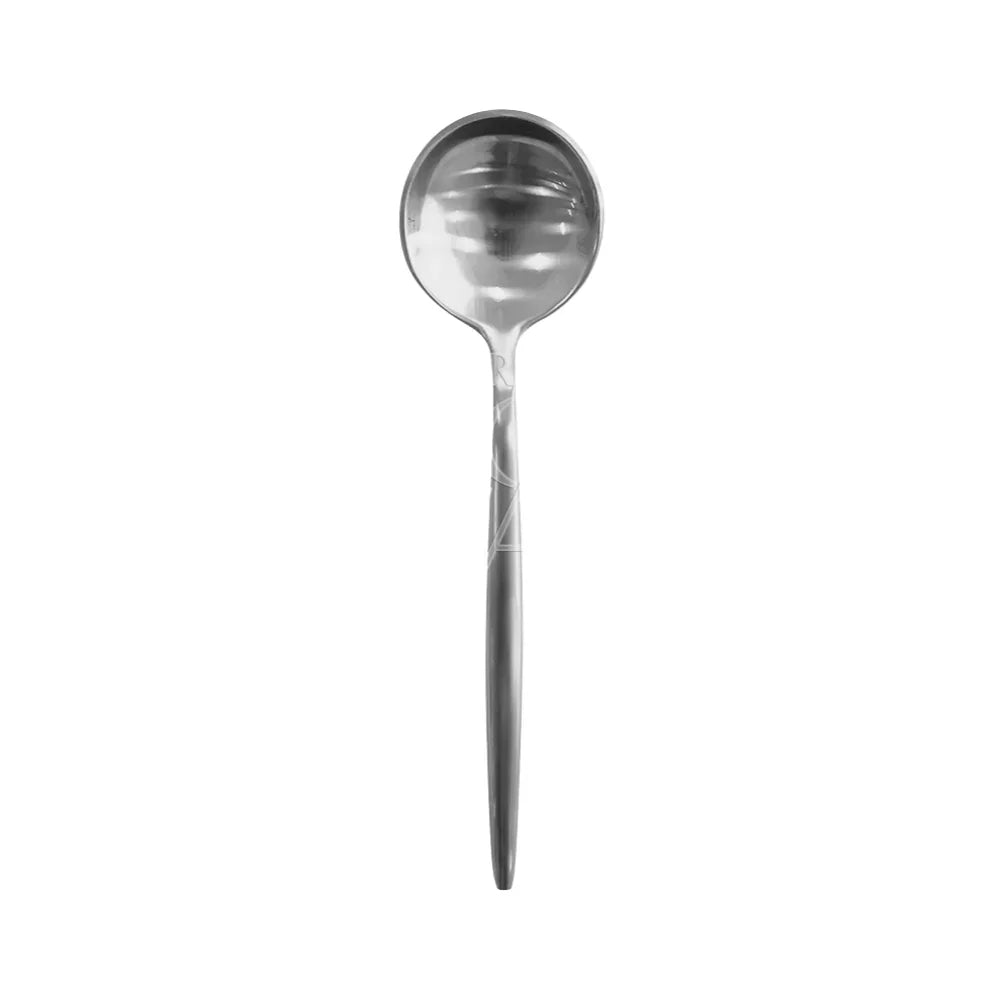 Close-up of the CUTLERY MODERN SILVER, featuring a sleek, long-handled silver spoon, ideal for elegant events and special occasions.