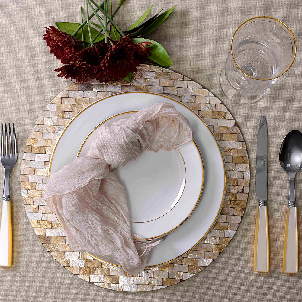 Round Shell Placemat displayed with table setting, glass, and knife close-ups.