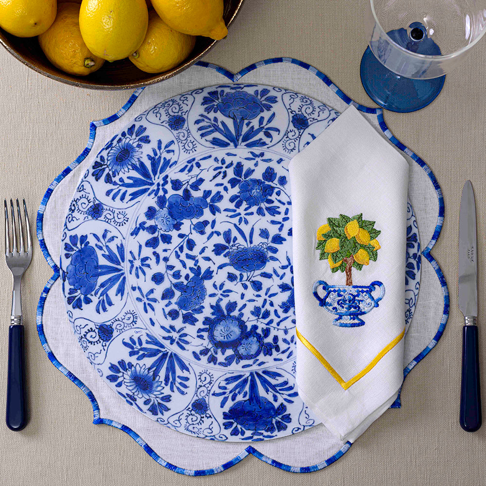 Delft Die-Cut Placemat with lemons and glass, close-ups.