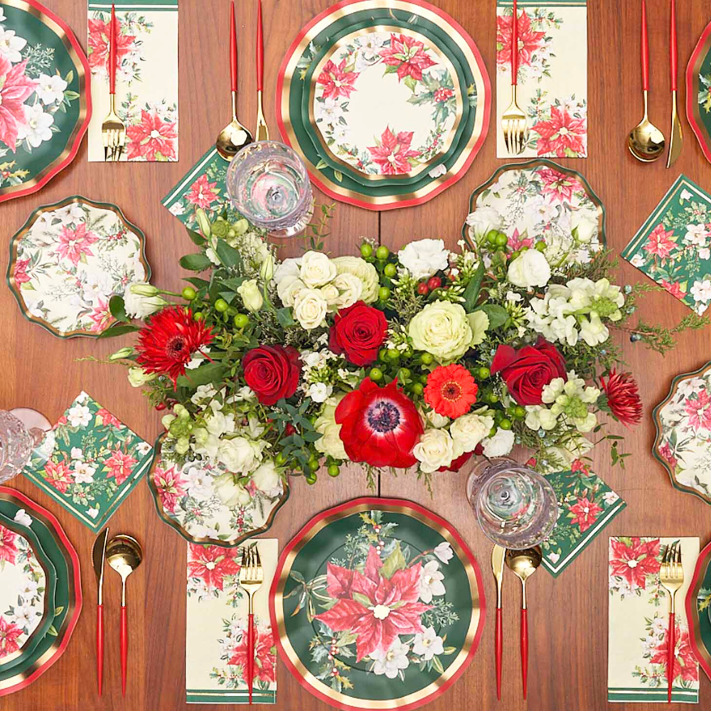 Evergreen Floral Cocktail Napkins, featuring a delicate floral design, elegantly arranged on a table with plates and flowers, perfect for enhancing any event setting.