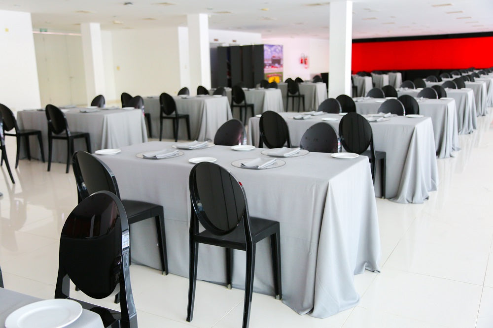 Ghost Chair without arms, featuring a sleek, round back design, ideal for weddings and corporate events. Perfect for versatile event settings.