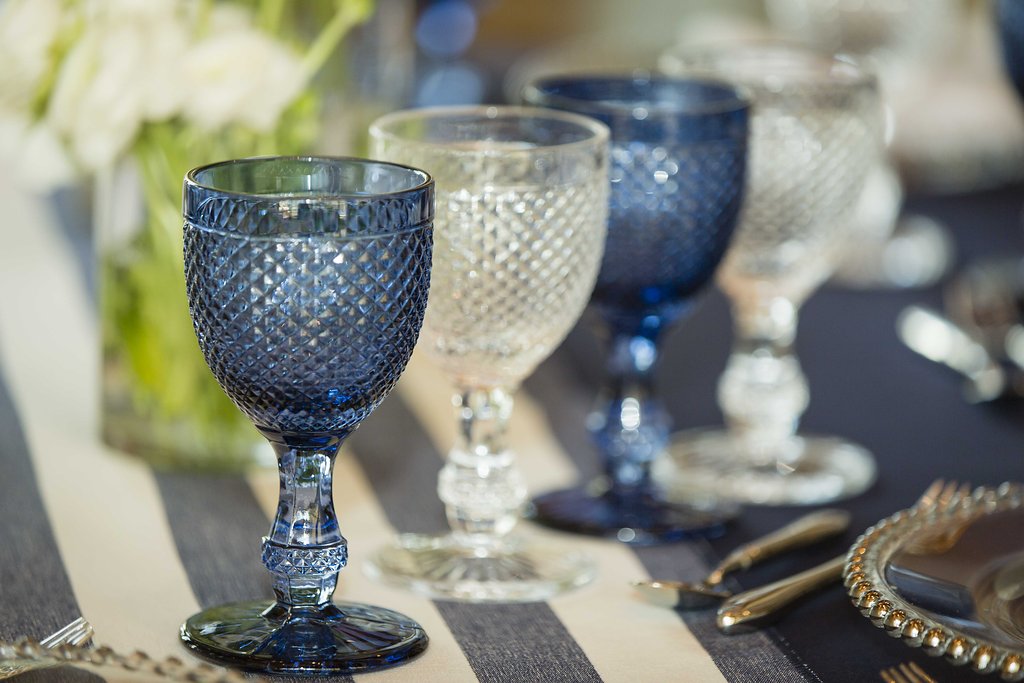 Vintage Diamond Goblets displayed on a table, showcasing elegant stemware perfect for enhancing any event setting with a touch of sophistication.