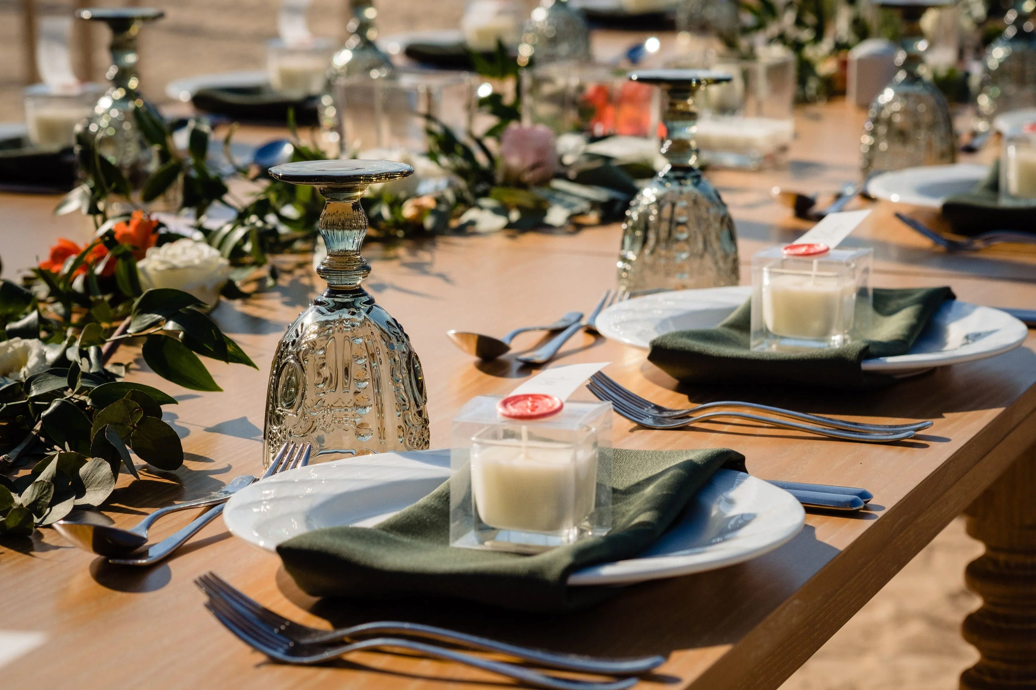 Vintage Crest Goblet Glass on a table set with dishware and silverware, ideal for enhancing elegant or casual event decor.