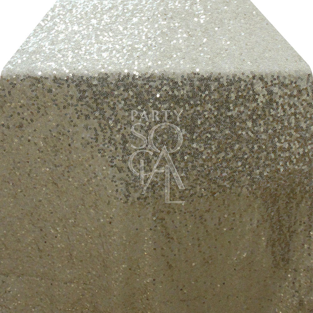 Sequin table runner with a shimmering surface, ideal for elegant party decor, capturing light beautifully for glamorous occasions.