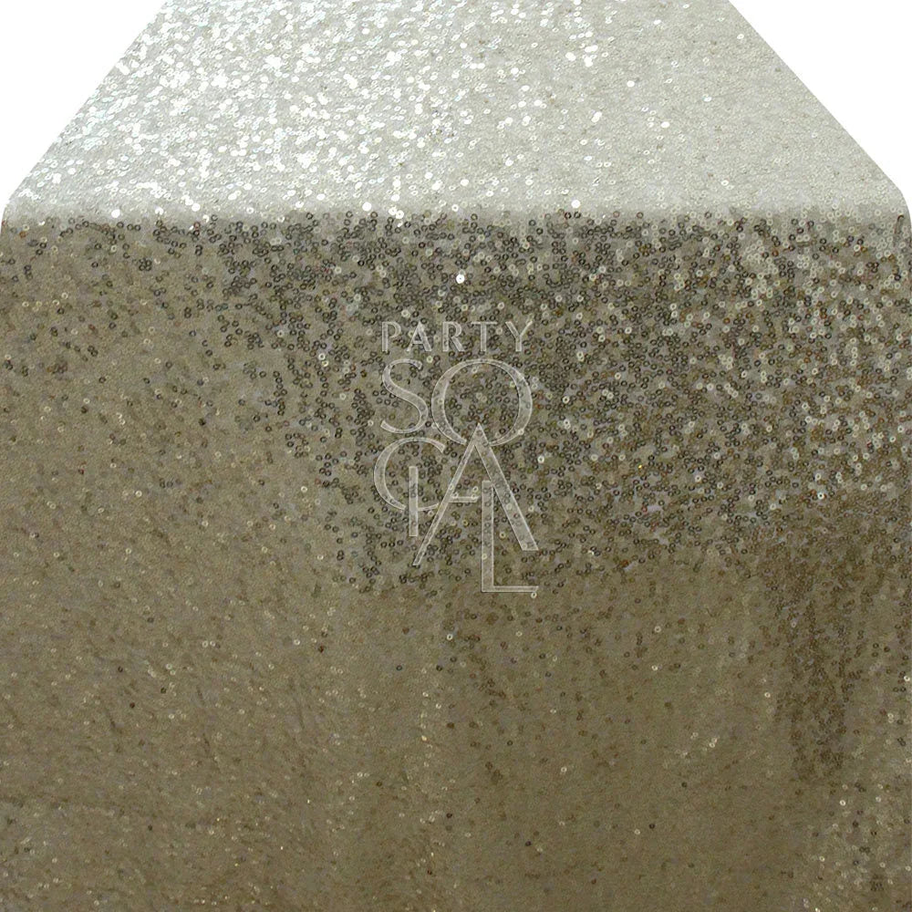 Sequin table runner with a shimmering surface, ideal for elegant party decor, capturing light beautifully for glamorous occasions.