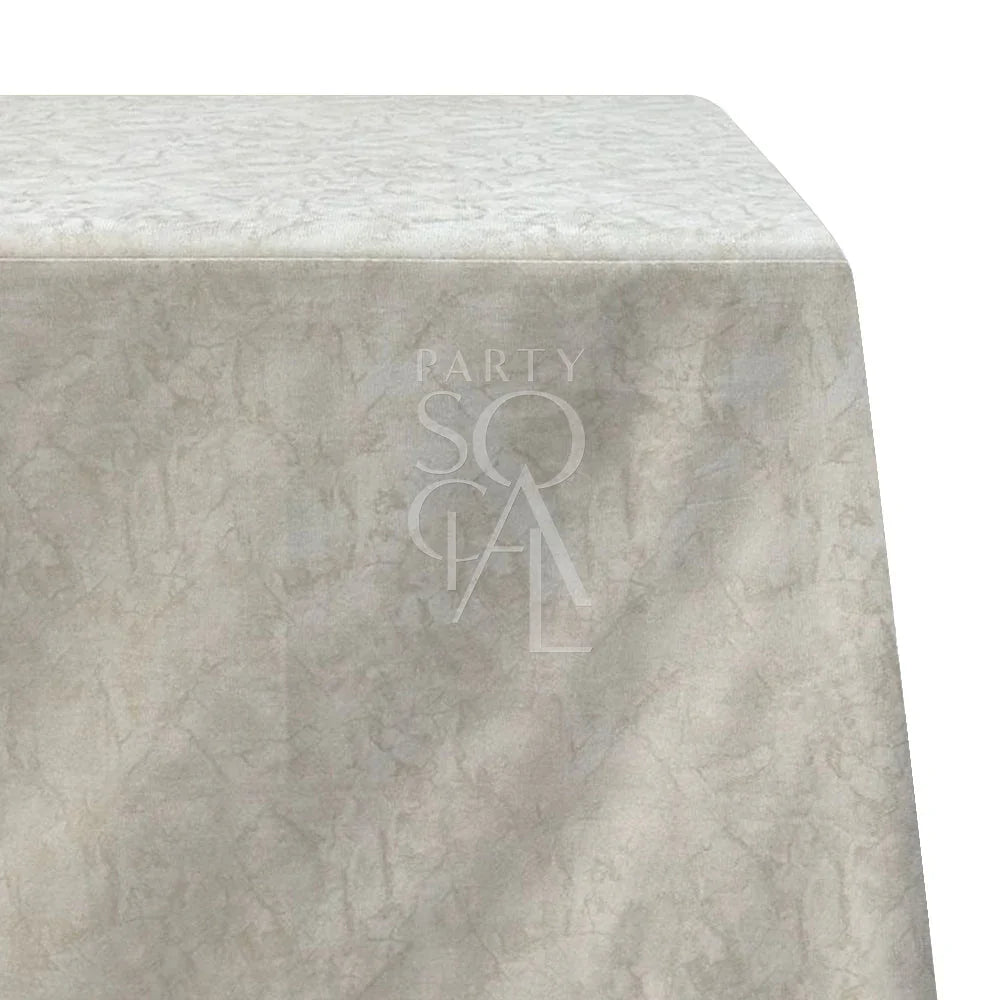 GOLD FOIL RECTANGULAR TABLECLOTH featuring a sleek polylinen design with a subtle logo, ideal for upscale dining setups at weddings or special occasions.