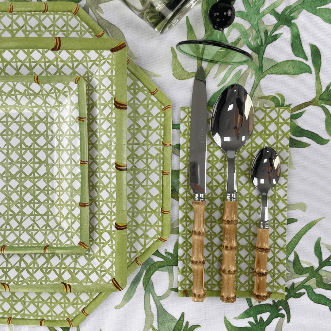 Holly Trellis Square Paper Salad & Dessert Plates - 8 Per Package, shown with matching cutlery, ideal for elegant yet effortless party table settings.