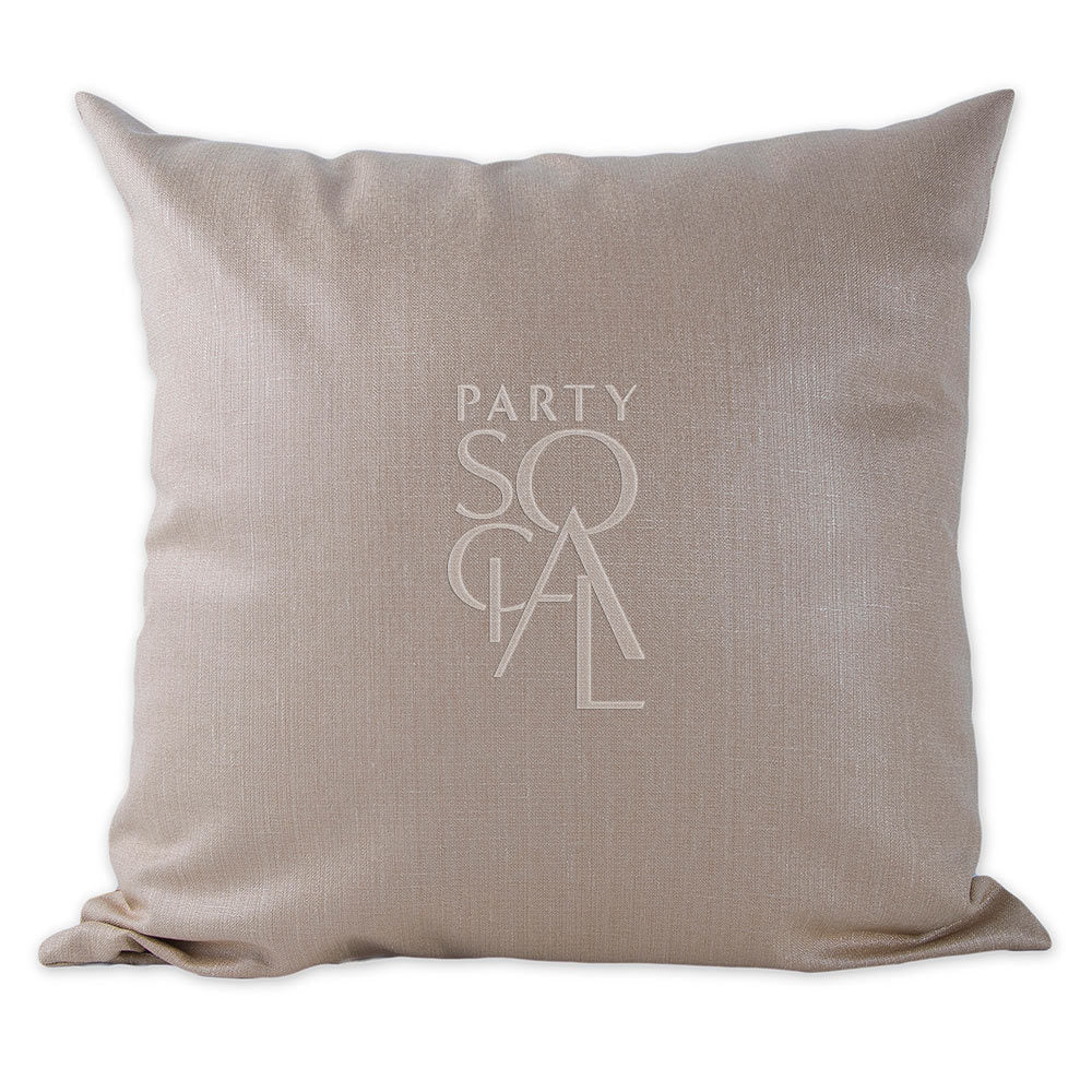 CUSHION COVER LINEN BLEND featuring a subtle logo, showcasing a detailed fabric texture, ideal for adding elegance to party and event settings.