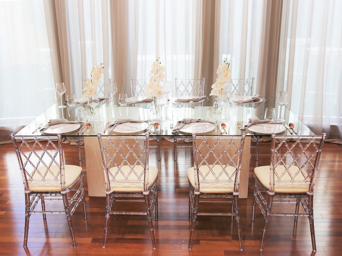 Diamond Back Acrylic Chair set for a dinner party, showcasing its elegant design, ideal for weddings and events.