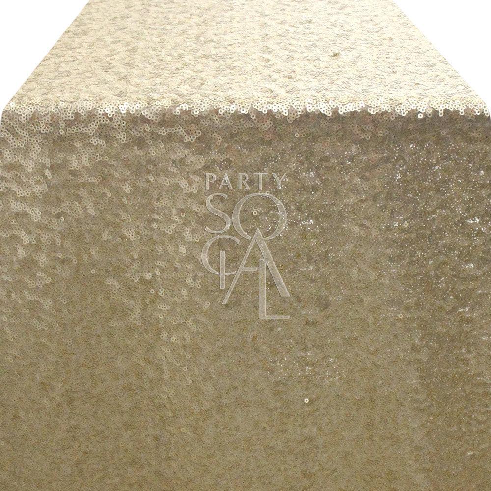 Sequin Table Runner: A shimmering rectangular table runner with sequins, ideal for adding elegance to special occasions and party table settings.