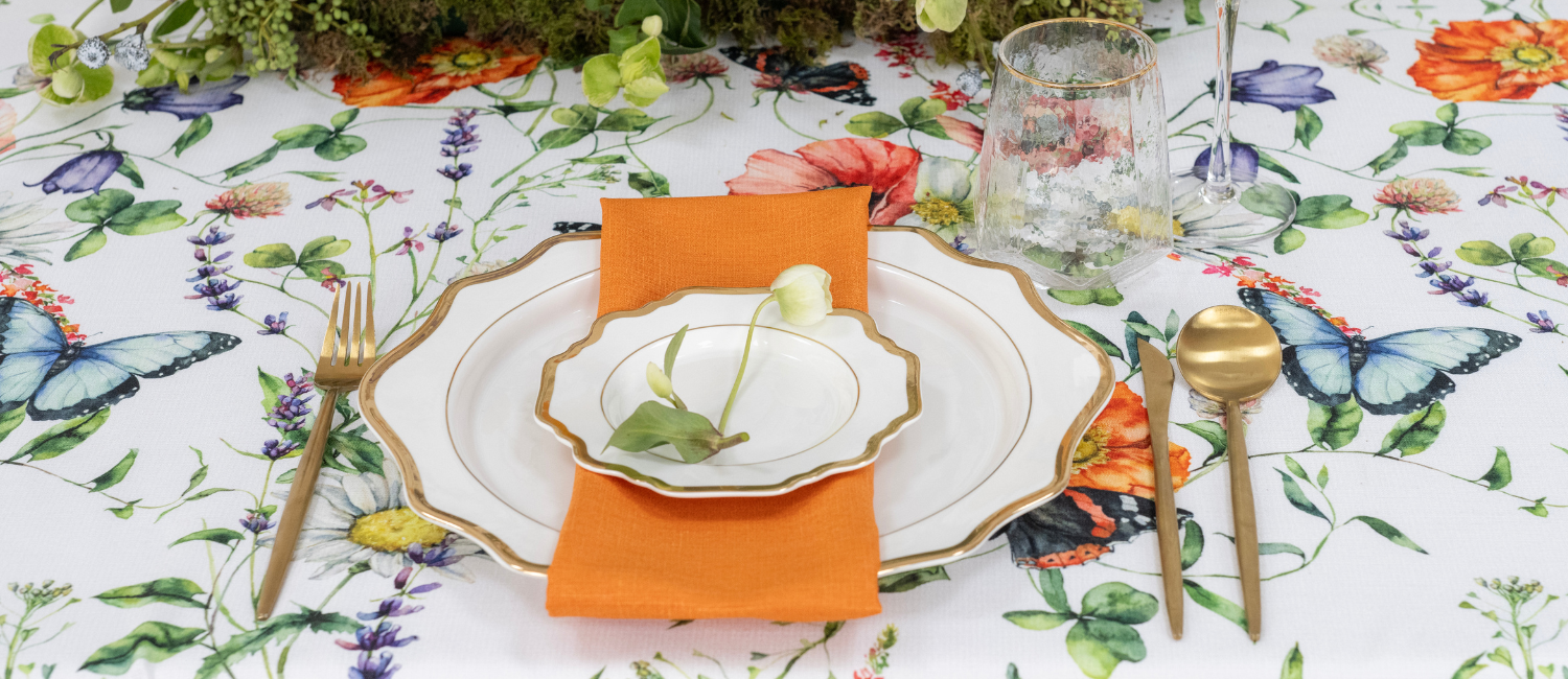 Lotus gold charger plates with butterfly printed tablecloth
