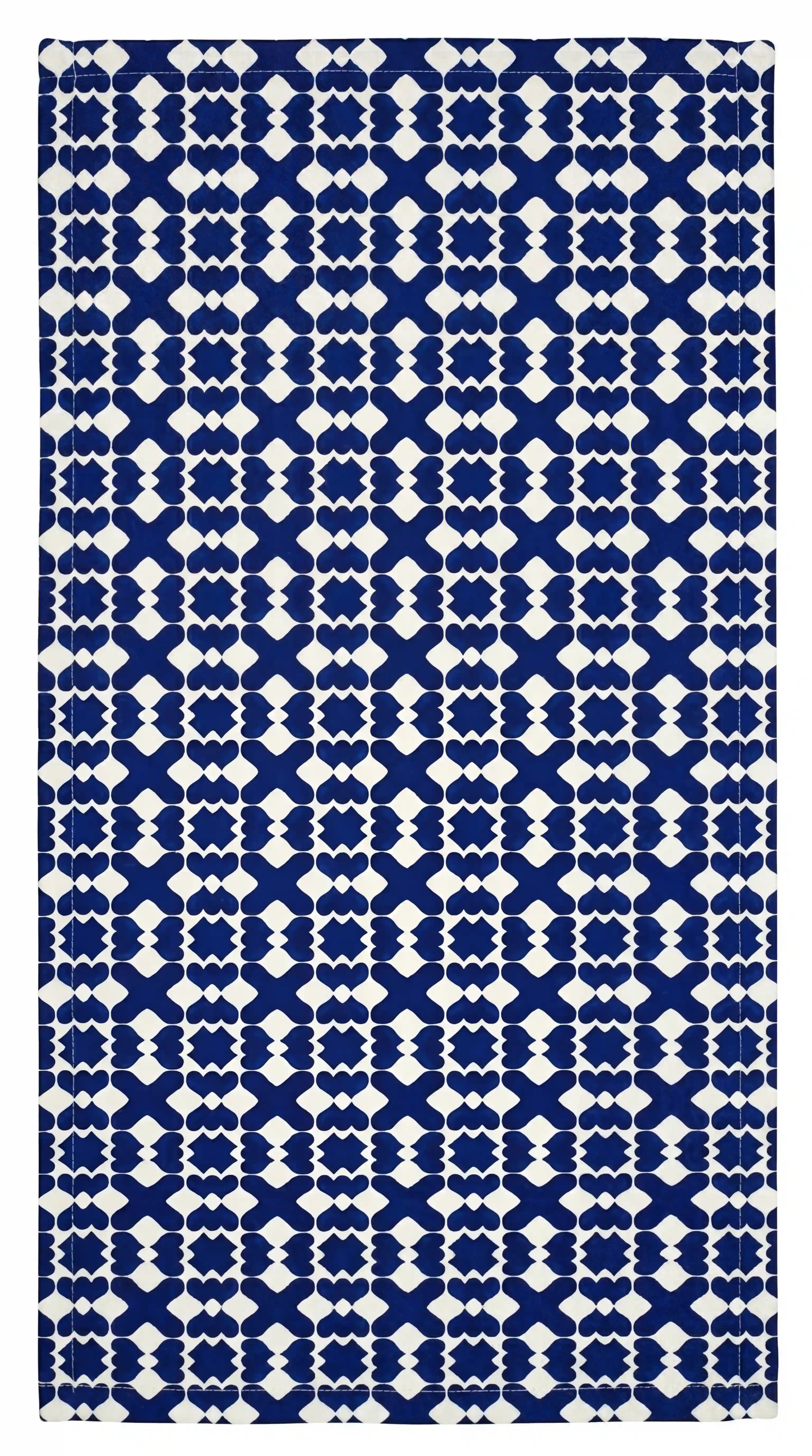 Marrakesh Linen Tablecloth, featuring a cobalt-blue geometric motif on a white base, ideal for elevating Mediterranean and contemporary table settings at events.
