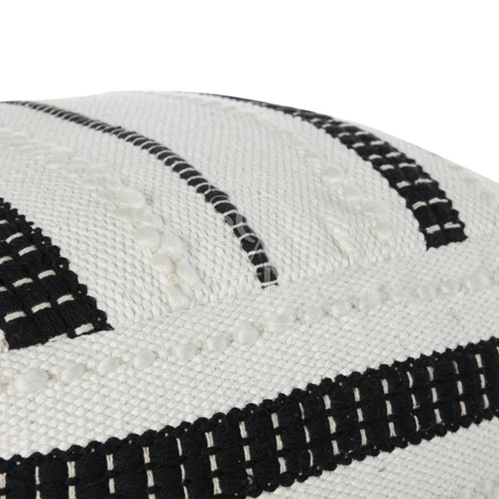 FABRIC & JUTE POUFS close-up showcasing detailed black and white knitted pattern, highlighting its elegant and functional design for versatile use in party settings.
