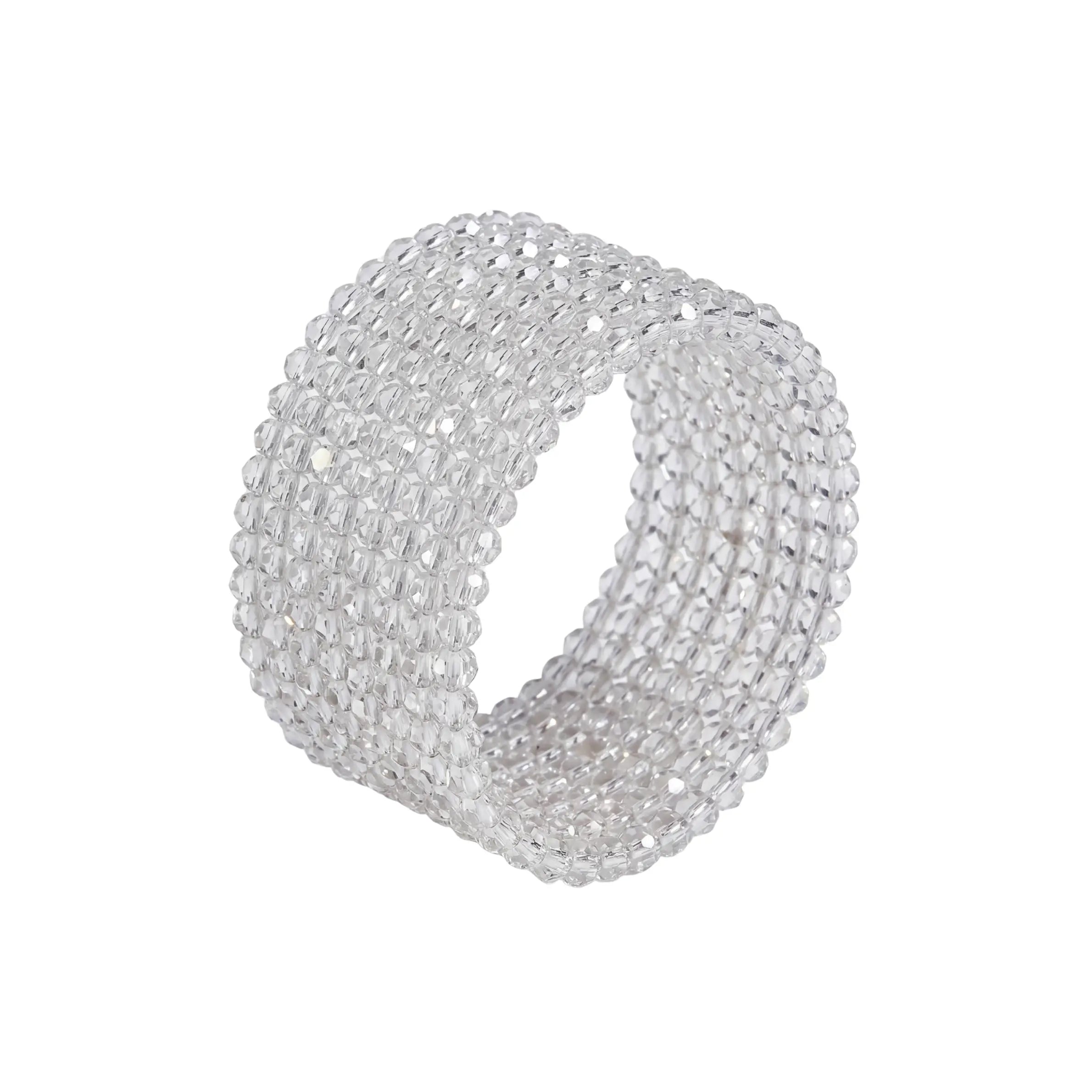 NAPKIN RING - DIAMANTE ROUND: A sparkling, transparent cuff of clear faceted beads, perfect for adding elegance to any party tablescape.