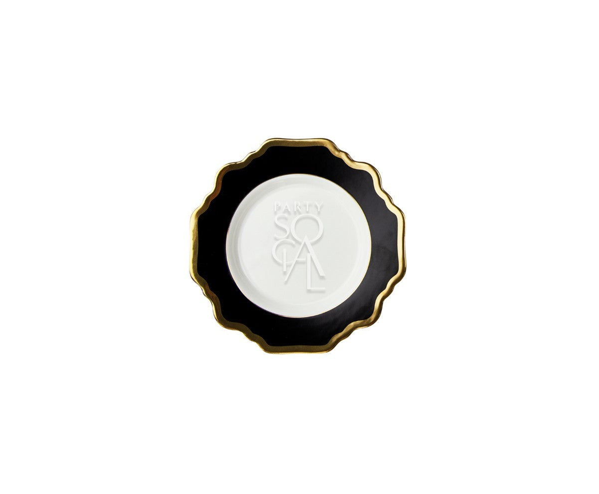 CHARGER PLATE - LOTUS: A modern circular black and gold charger plate, ideal for luxurious table settings, measuring 34cm in diameter.